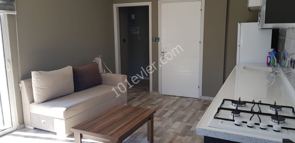 girne merkezde aslanlı villada full eşyalı kiralık 2+1 lüks eşyalı daire..   05338445618