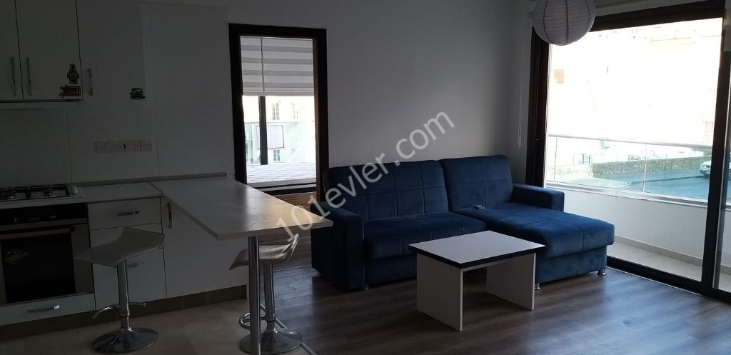 girne merkezde lüks, asansörlü ve kapalı otoparklı rezidansta güvenlikli, lüks eşyalı 2+1 daire 05338445618