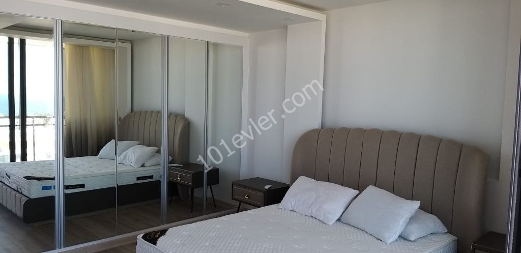 our spacious, spacious apartment with 3 + 1 full modern furniture for rent on the top floor of FEO elegance with this unique view, which offers almost sky-high life in the largest structure of Kyrenia, opens the doors to luxury and high-quality life for you... 05338445618 ** 