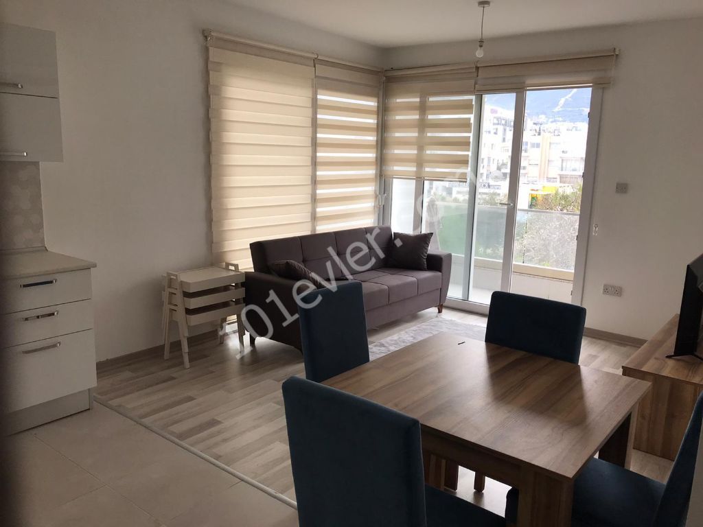 1+1 fully furnished apartment for rent in one of the best quality buildings in the market that has proven itself in the old astro market in the center of girne. . .  400 STG 05338445618 ** 