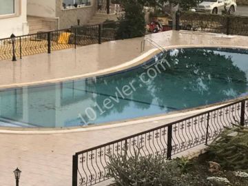 girne amerikan üniversitesine yürüyüş mesafesinde, havuzlu, güvenlikli sitede deniz manzaralı, geniş bahçeli, full eşyalı kiralık 2+1 daire   05338445618