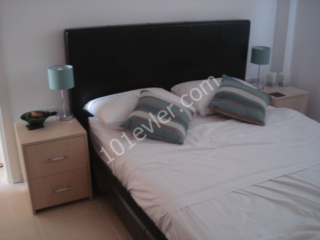 Two Bedroom Top Floor Apartment with Private Roof Terrace in Tatlısu near Magusa. Ref: TU539