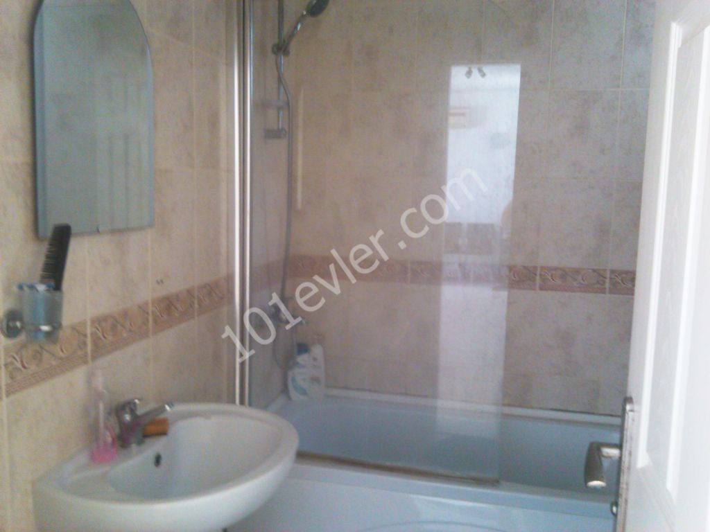 Two Bedroom Top Floor Apartment with Private Roof Terrace in Tatlısu near Magusa. Ref: TU539