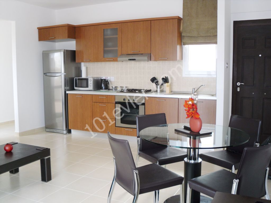 Two Bedroom Top Floor Apartment with Private Roof Terrace in Tatlısu near Magusa. Ref: TU539