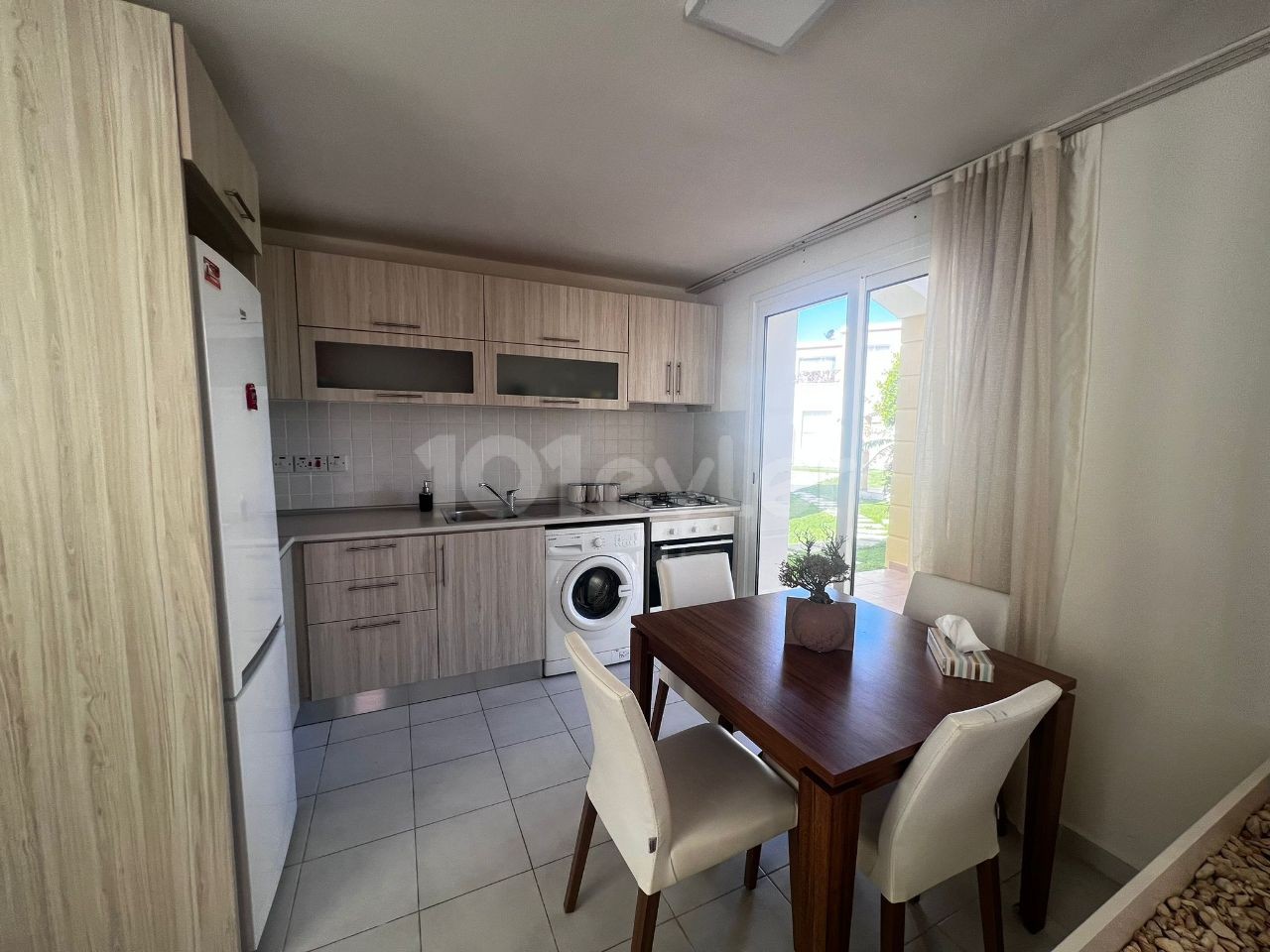 Fully furnished 1+1 Flat for rent on the Ground Floor in a complex with a pool in Kyrenia Center, Cyprus