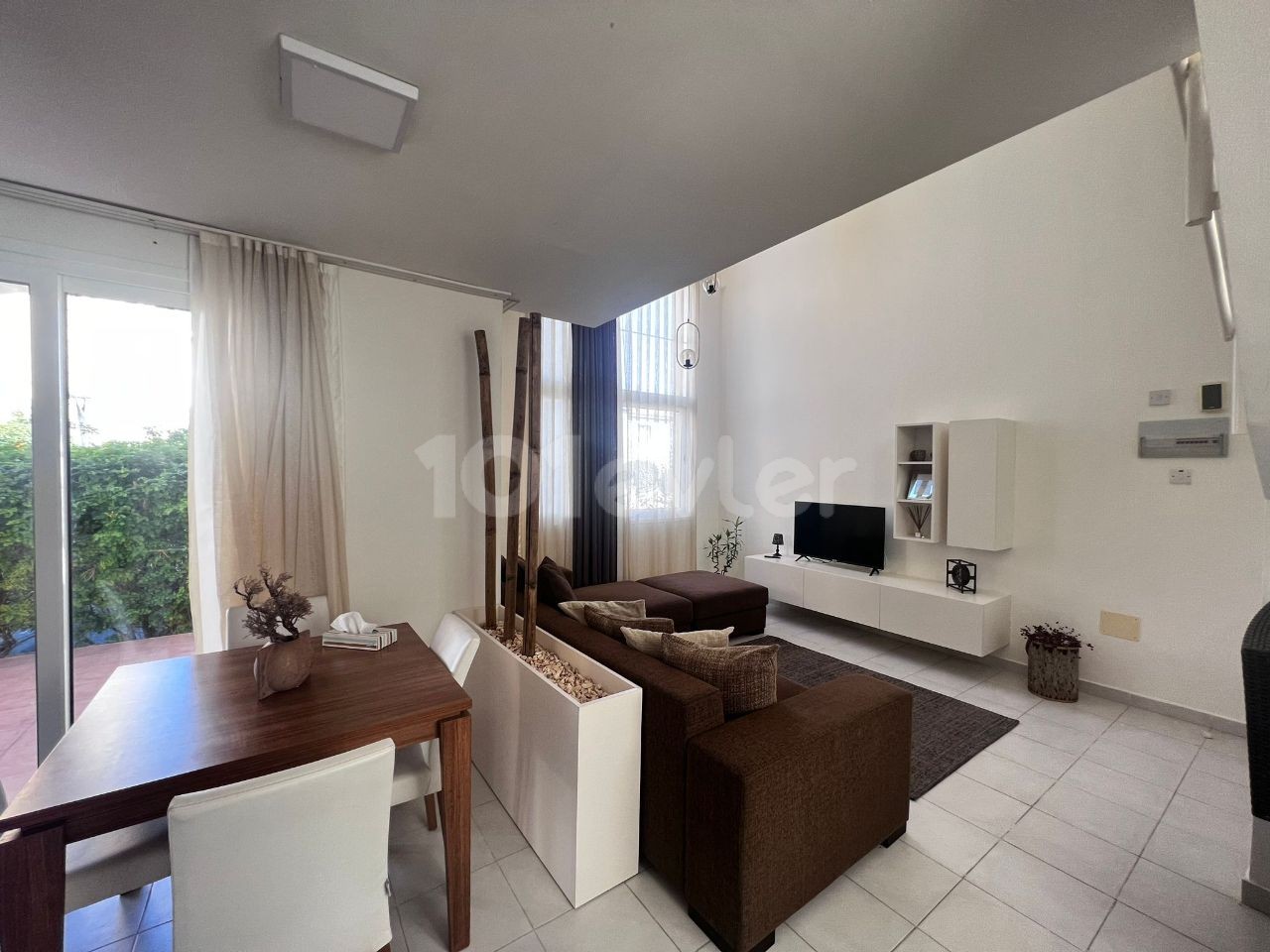 Fully furnished 1+1 Flat for rent on the Ground Floor in a complex with a pool in Kyrenia Center, Cyprus