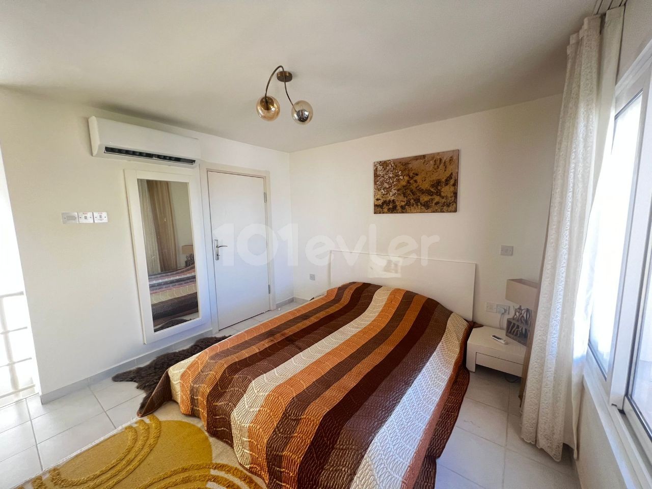 Fully furnished 1+1 Flat for rent on the Ground Floor in a complex with a pool in Kyrenia Center, Cyprus