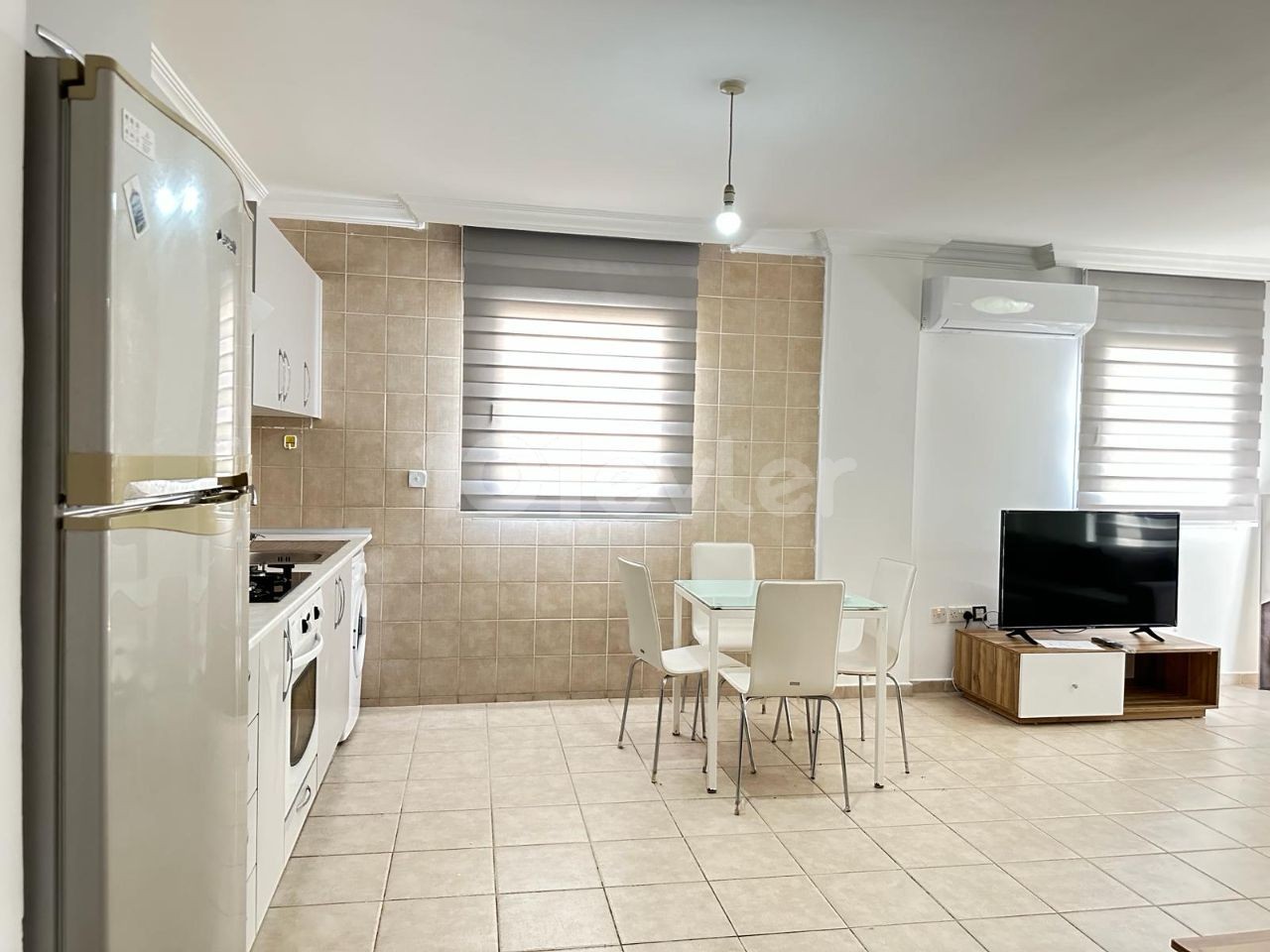 1+1 FLAT FOR RENT IN A SITE WITH POOL IN KYRENIA CENTER