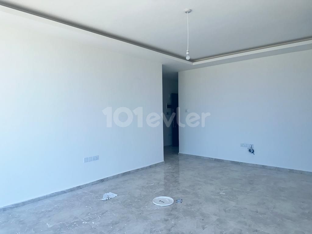 3+1 FLAT FOR SALE IN THE CENTER OF KYRENIA WITH STUNNING MOUNTAIN, SEA AND CITY VIEW