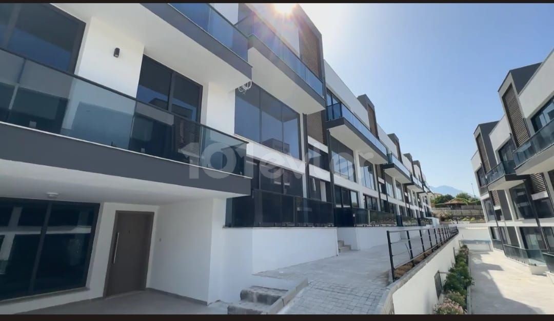 2+1 flats for sale in a site with a shared pool in Alsancak