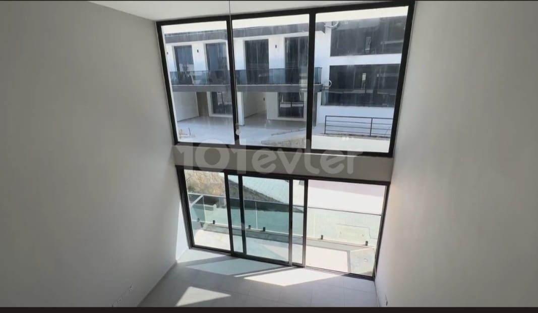 2+1 flats for sale in a site with a shared pool in Alsancak