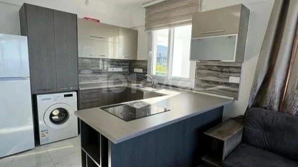 Girne şehir merkezinde deniz ve dağ manzaralı kiralık 2+1 lüks daire