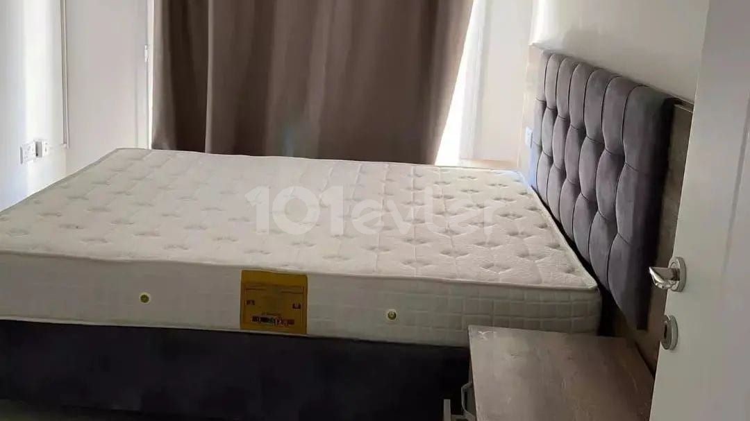 Girne şehir merkezinde deniz ve dağ manzaralı kiralık 2+1 lüks daire