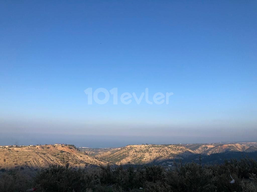 FOR SALE LAND IN KYRENIA-FAMAGUSTA ROAD, WITH FULL SEA AND MOUNTAIN VIEW.