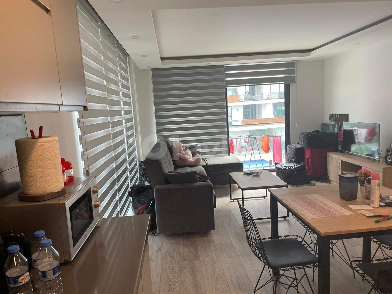 ULTRA LUXURY 1+1 FLAT IN KYRENIA CENTER AKACAN WITH EXTENSIVE FACILITIES SUCH AS SWIMMING POOL AND PARKING PARKING FULL CITY VIEW AND 2 BALCONIES..