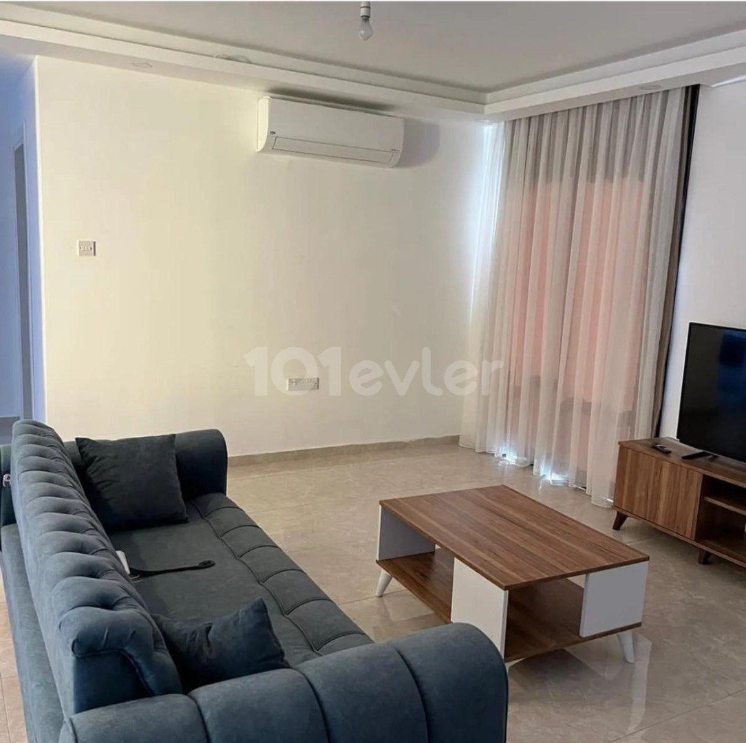 2+1 Apartment for Sale in a Complex with Pool in Alsancak