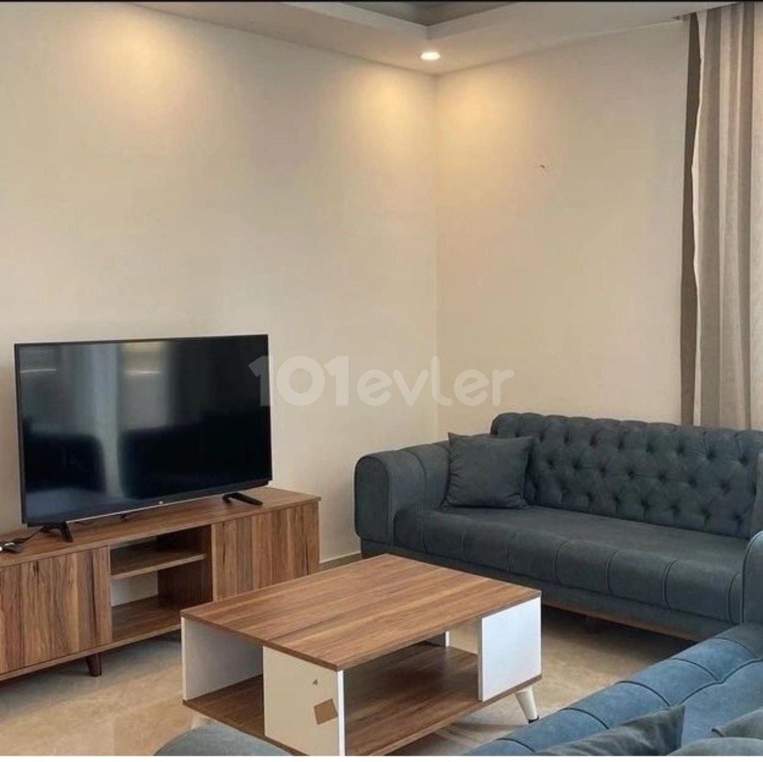 2+1 Apartment for Sale in a Complex with Pool in Alsancak