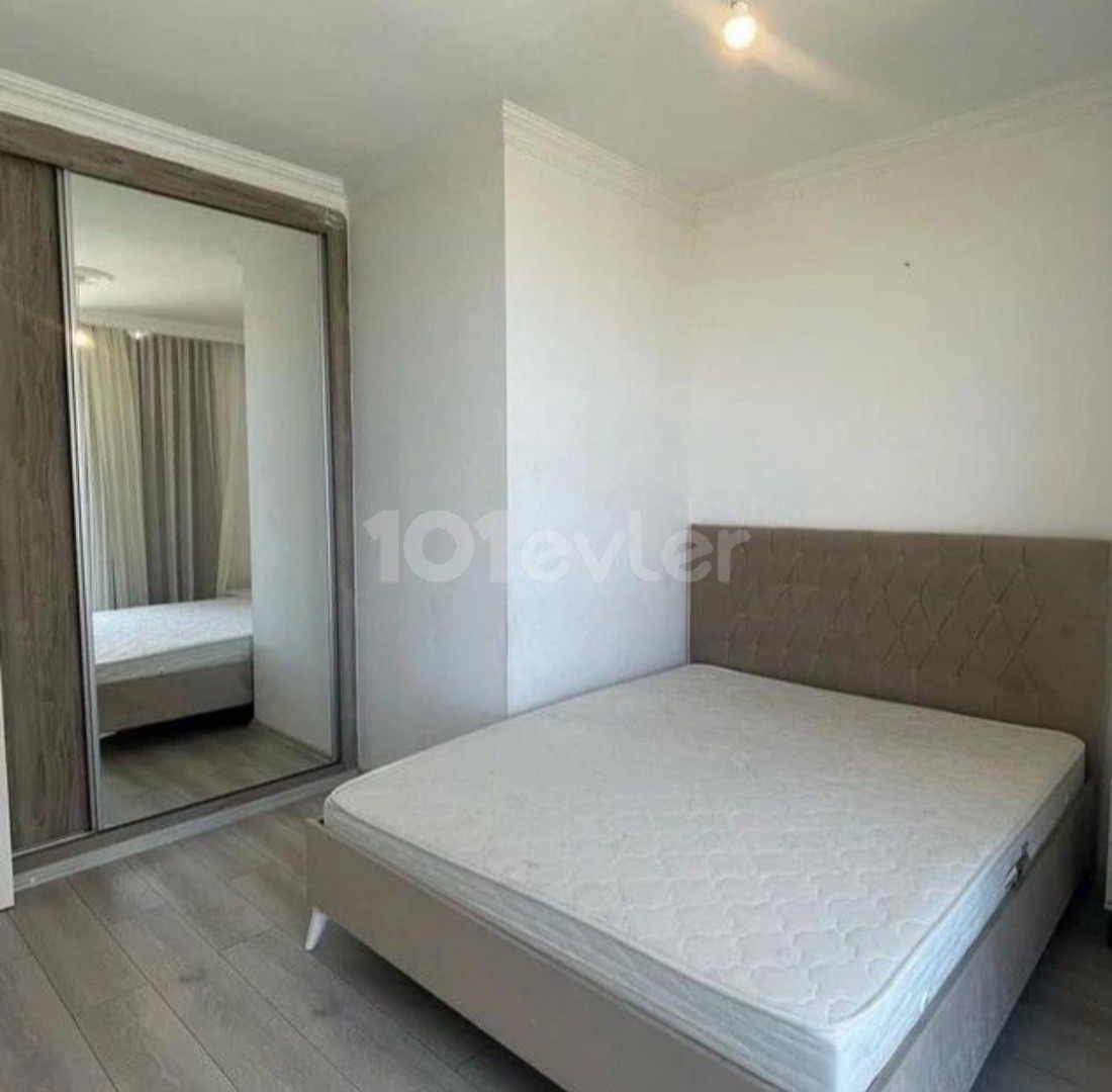 2+1 Apartment for Sale in a Complex with Pool in Alsancak