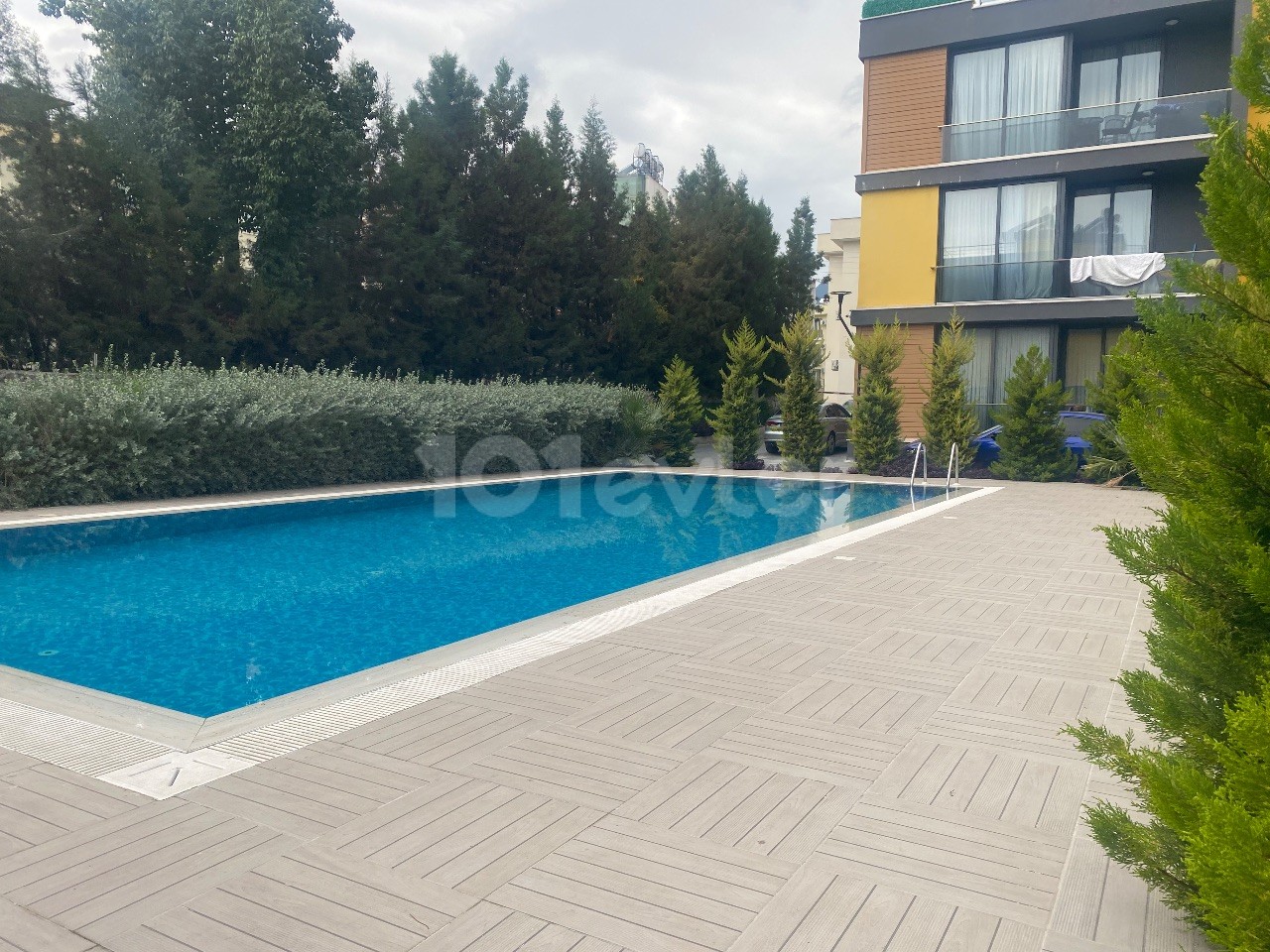 2+1 Apartment for Sale in a Complex with Pool in Alsancak