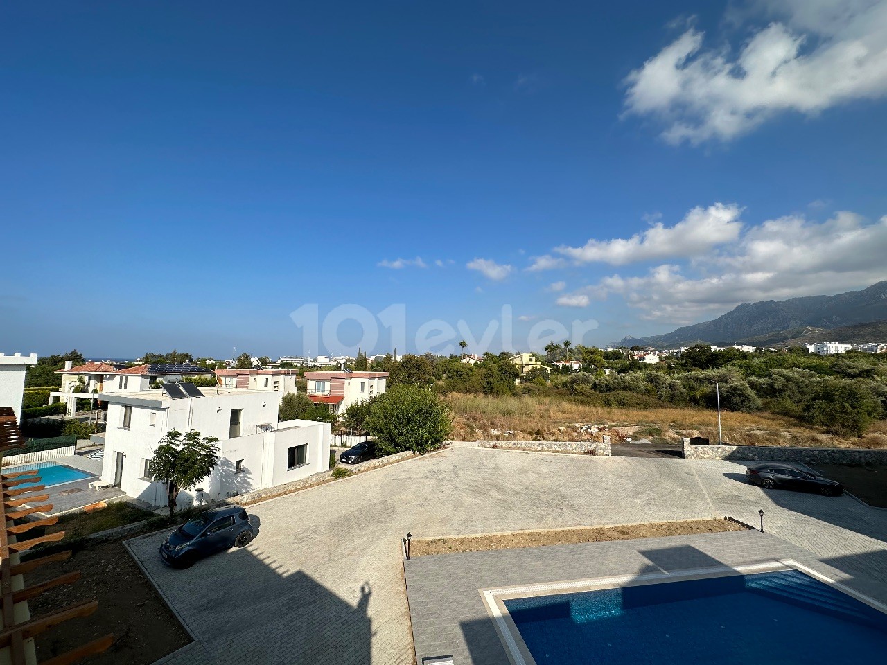 2+1 Spacious Flat for Sale with Sea and Mountain Views in Kyrenia Alsancak Pool Site