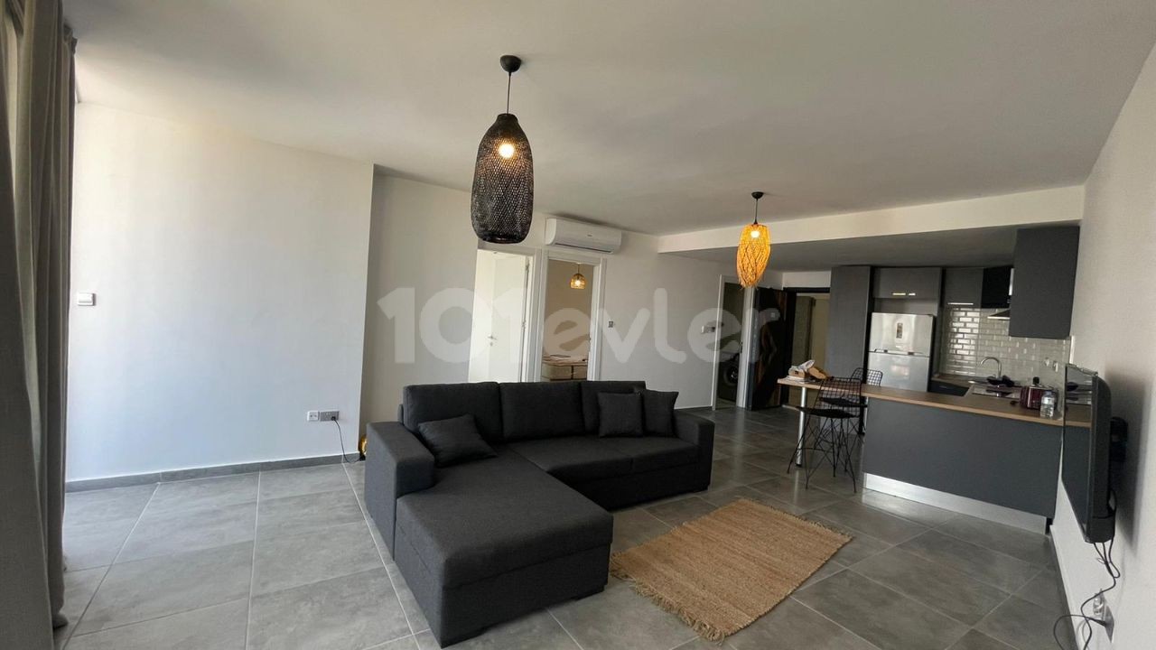 LUXURY 2+1 IN GIRNE WITH GYM, SWIMMING POOL, PRIVATE UNDERGROUND PARKING AREA 