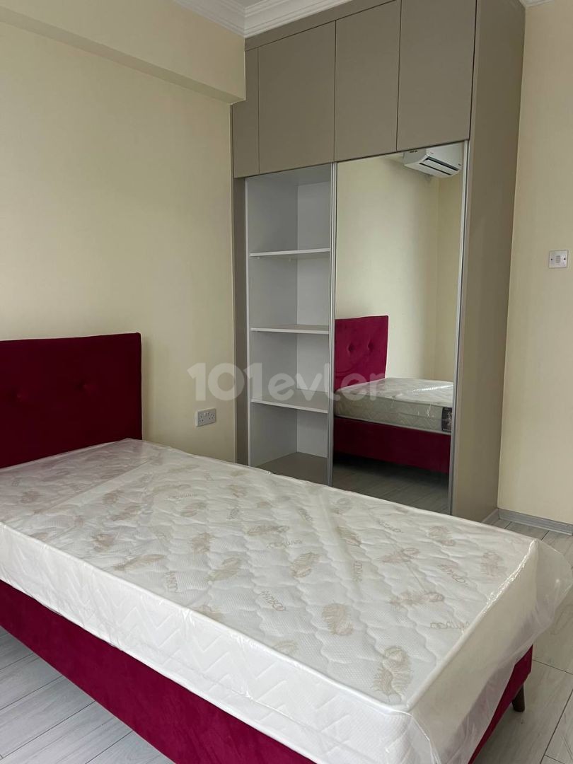 **ALSANCAK'TA SIFIR BİNA YENİ EŞYALI KİRALIK 2+1 DAİRE** 