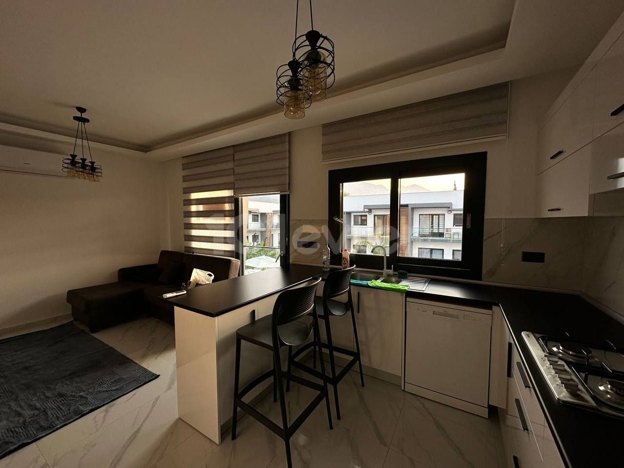 *** 1+1 FLAT FOR RENT WITH SHARED POOL IN ALSANCAK, WALKING DISTANCE TO THE SEA***