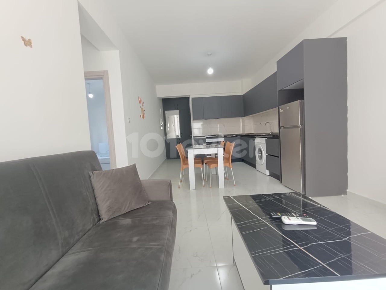 Luxury apartment for rent in perfect condition at the bottom of Gonyeli market and bus stop.