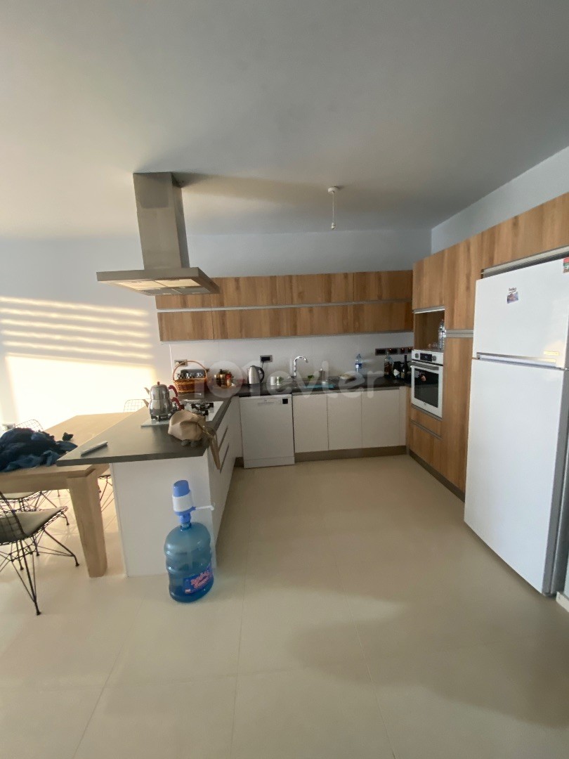 GIRNE KASKAR 1+1 PENTHOUSE WITH TERRACE AND SEA VIEW FULLY FURNISHED FLAT FOR SALE WITH TENANT