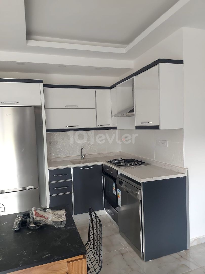 2+1 FLAT FOR SALE IN İSKELE LONG BEACH IN A QUIET AREA WITH MOUNTAIN AND SEA VIEW