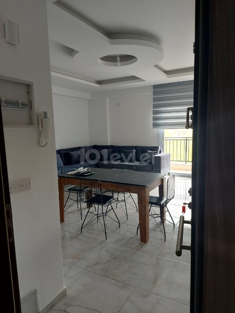 2+1 FLAT FOR SALE IN İSKELE LONG BEACH IN A QUIET AREA WITH MOUNTAIN AND SEA VIEW