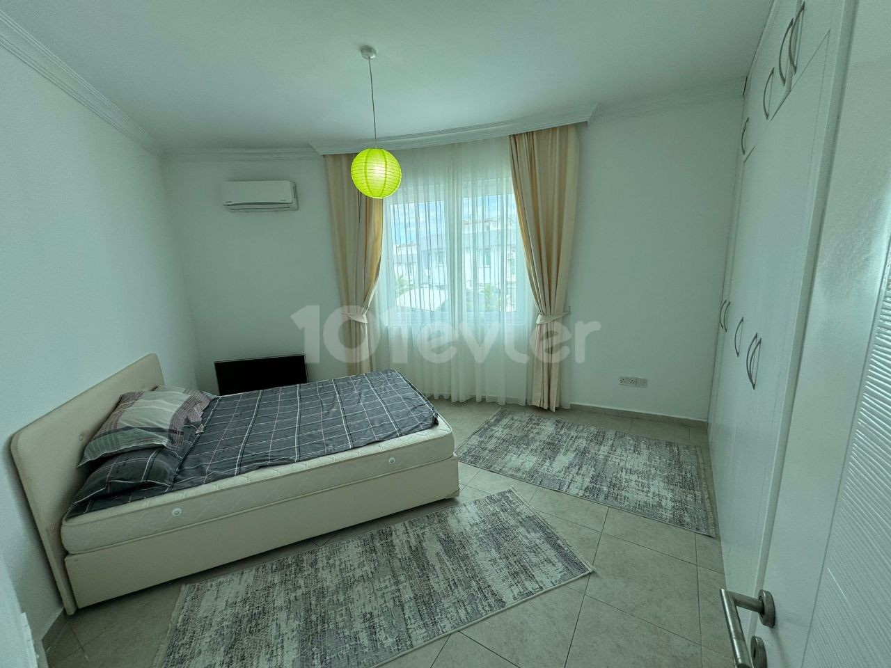 Fully furnished 1+1 flat for rent in Karaoğlanoğlu with a communal pool