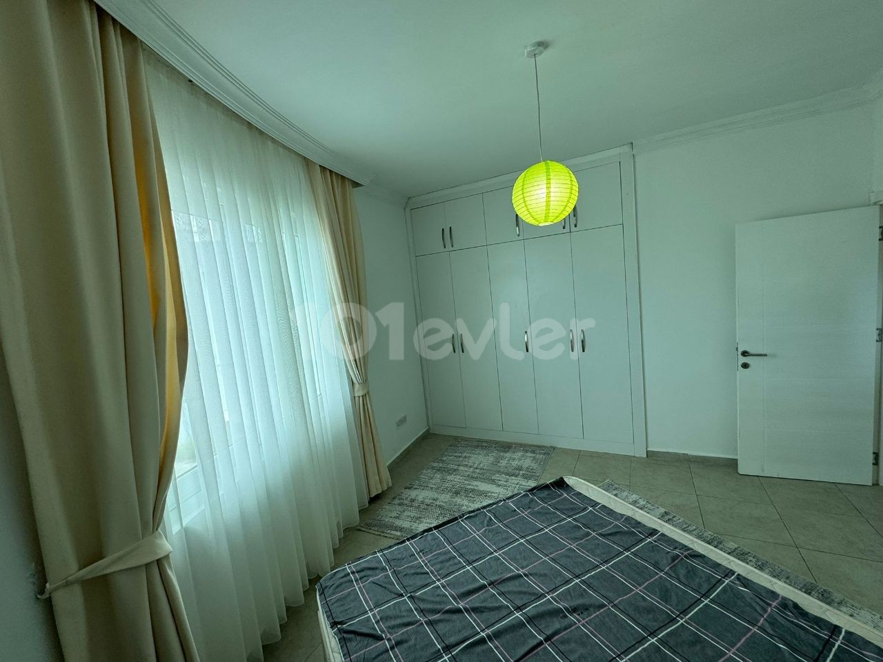 Fully furnished 1+1 flat for rent in Karaoğlanoğlu with a communal pool
