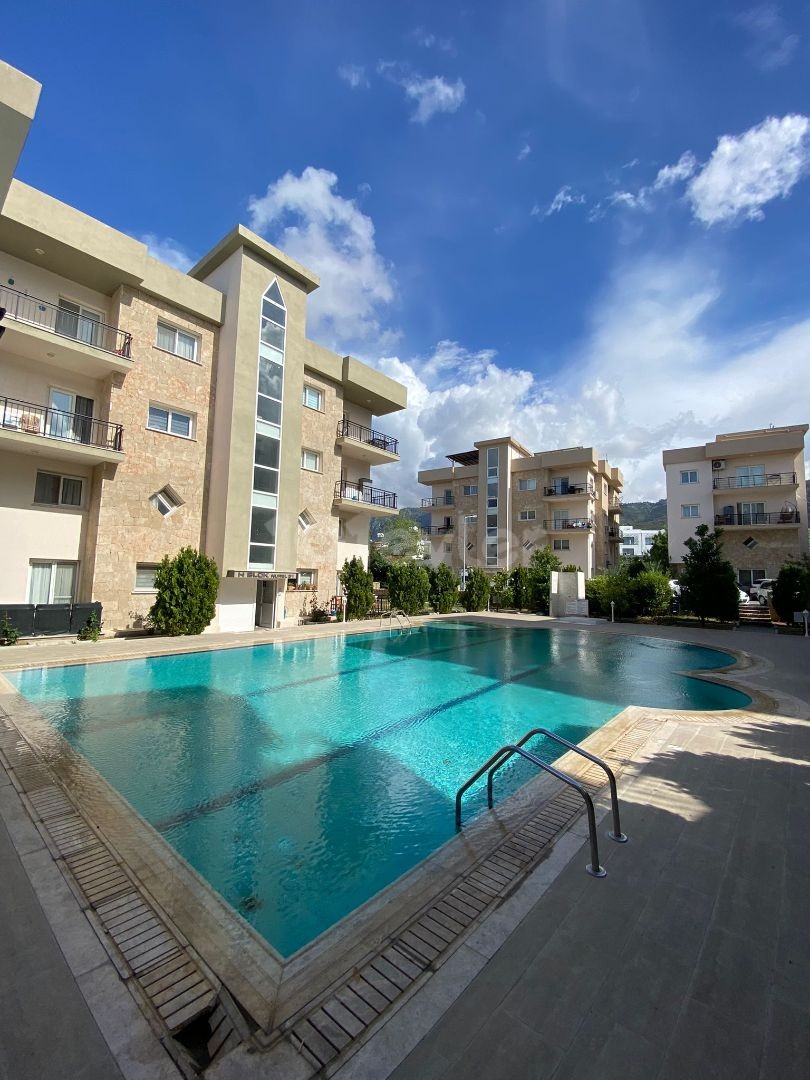 1+1 POOL BASIC - UNFURNISHED FLAT IN ALSANCAK AT A REASONABLE PRICE