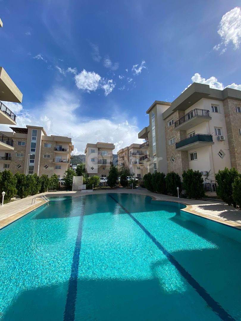 1+1 POOL BASIC - UNFURNISHED FLAT IN ALSANCAK AT A REASONABLE PRICE