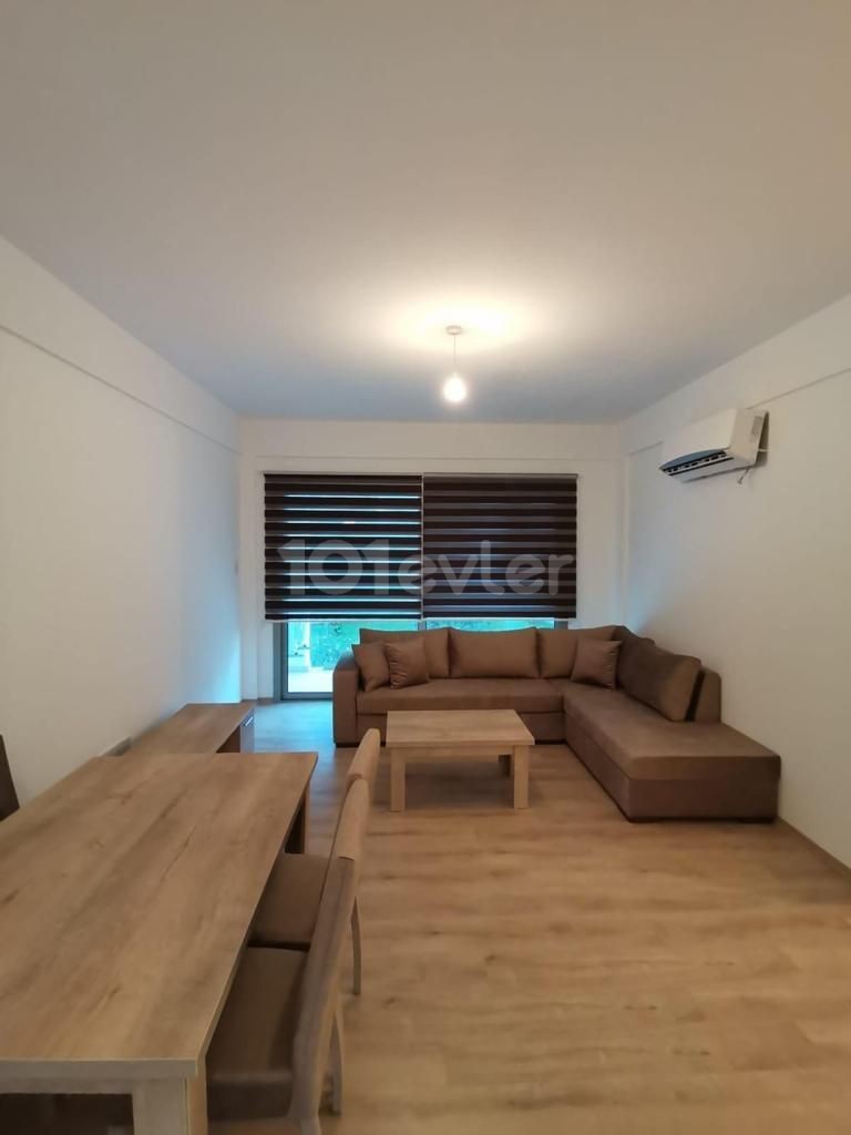 FOR RENT 2+1 APARTMENT ON GROUND FLOOR  IN ALSANCAK / CLOSE TO SHOCK MARKET AND "CAMELOT" BEACH