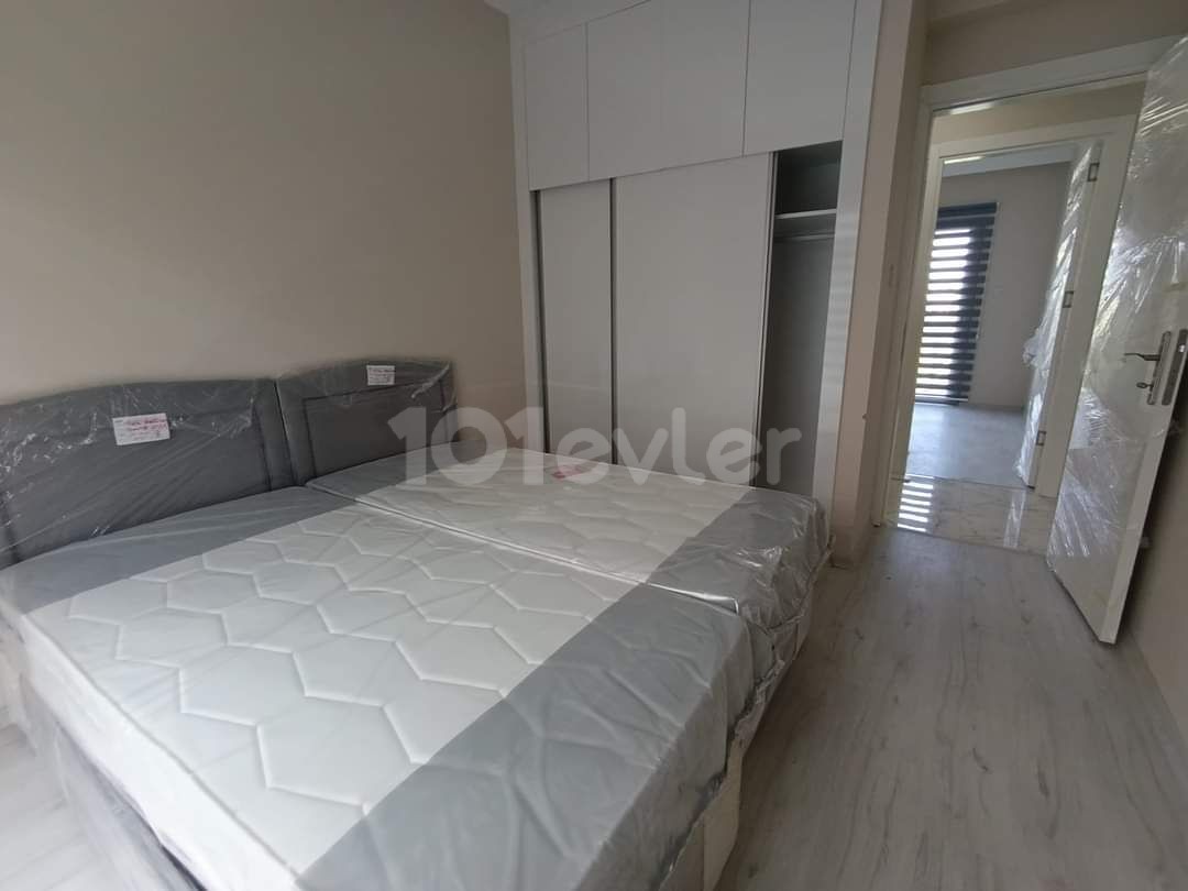 Girme lapta bölgesinde 3+1 sıfır eşyalı kiralık daire