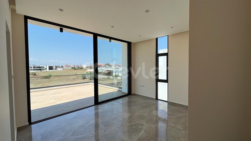 Modern style large and beautiful 4+1 villa in Yeniboğaziçi region just 3 minutes away from natural sandy beach Long Beach