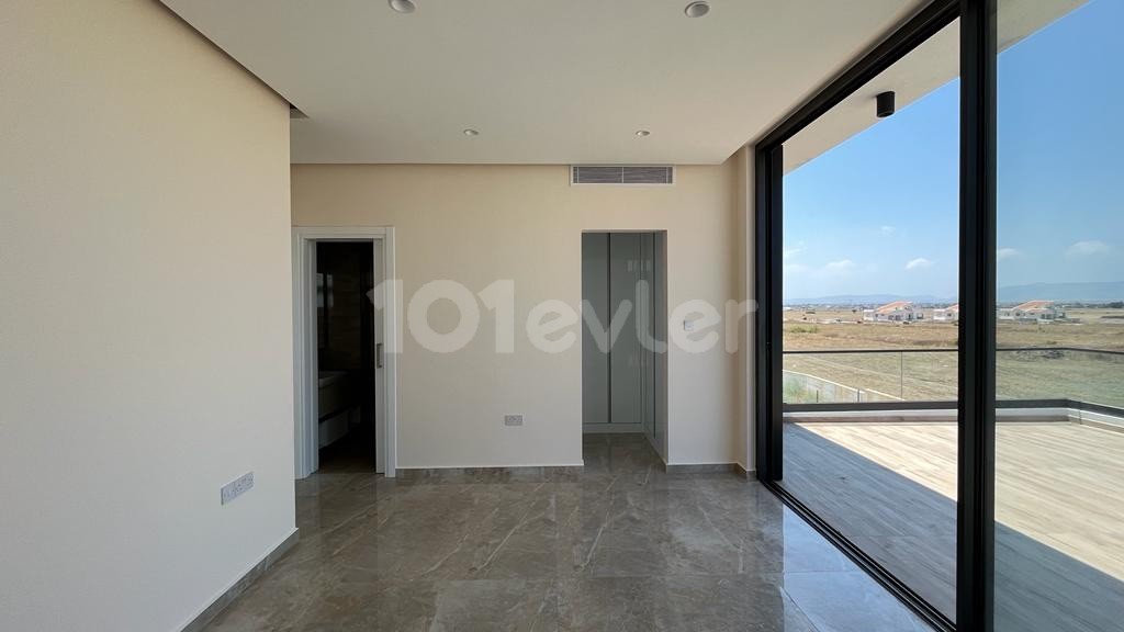 Modern style large and beautiful 4+1 villa in Yeniboğaziçi region just 3 minutes away from natural sandy beach Long Beach 