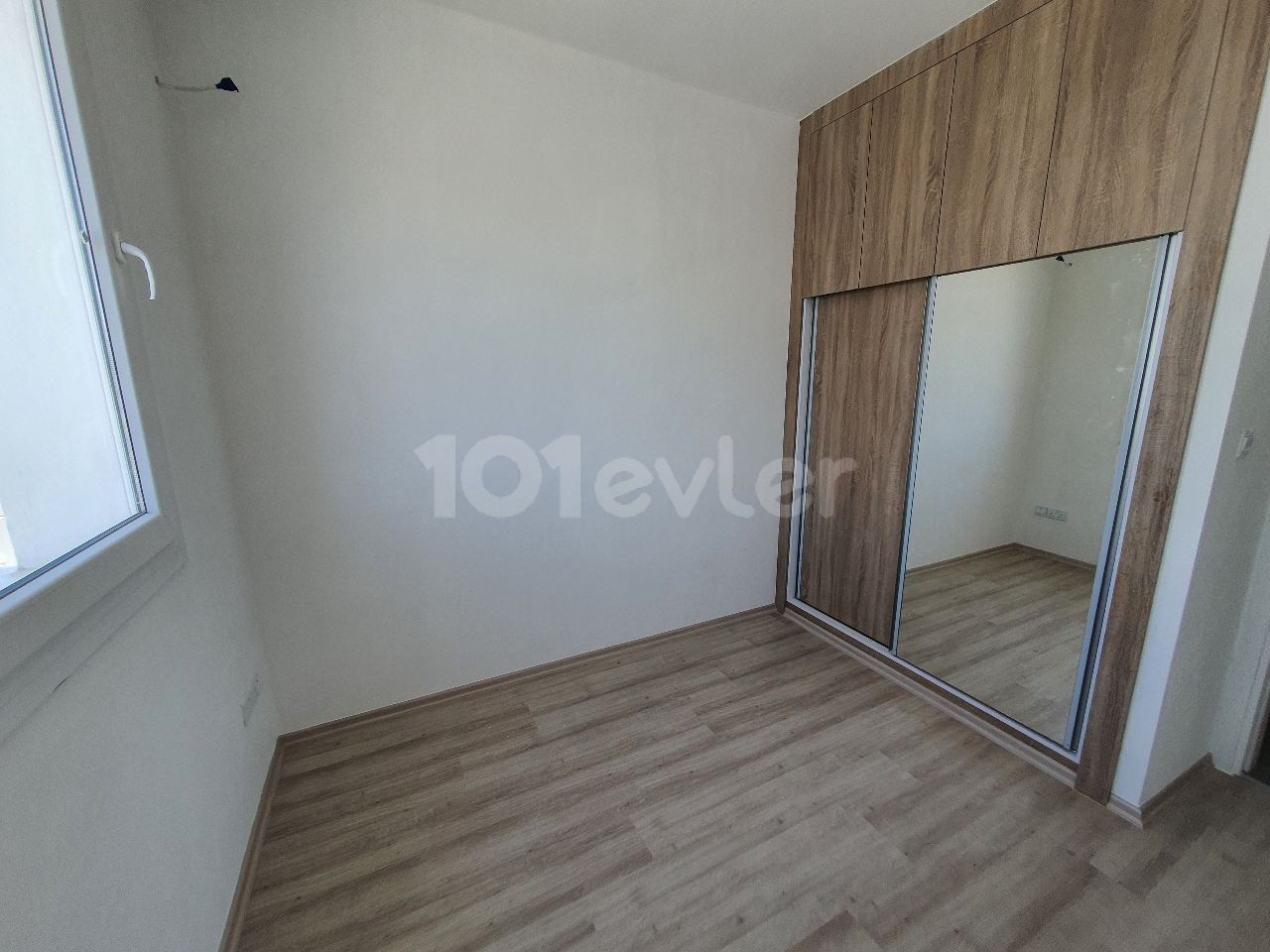 IN A QUIET AND PEACEFUL NEIGHBORHOOD OF 127M2 CONSISTING OF 4 APARTMENTS ON 2 FLOORS IN TOTAL IN MITRELI YEŞILADA DISTRICT 3 + 1 LUXURY APARTMENTS WITH ALL TAXES PAID WITH THEIR OWN LARGE TERRACE SECTION ** 