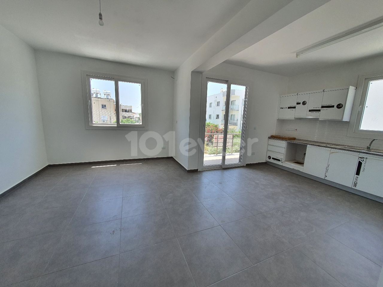 IN A QUIET AND PEACEFUL NEIGHBORHOOD OF 127M2 CONSISTING OF 4 APARTMENTS ON 2 FLOORS IN TOTAL IN MITRELI YEŞILADA DISTRICT 3 + 1 LUXURY APARTMENTS WITH ALL TAXES PAID WITH THEIR OWN LARGE TERRACE SECTION ** 