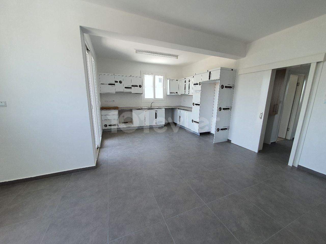 IN A QUIET AND PEACEFUL NEIGHBORHOOD OF 127M2 CONSISTING OF 4 APARTMENTS ON 2 FLOORS IN TOTAL IN MITRELI YEŞILADA DISTRICT 3 + 1 LUXURY APARTMENTS WITH ALL TAXES PAID WITH THEIR OWN LARGE TERRACE SECTION ** 