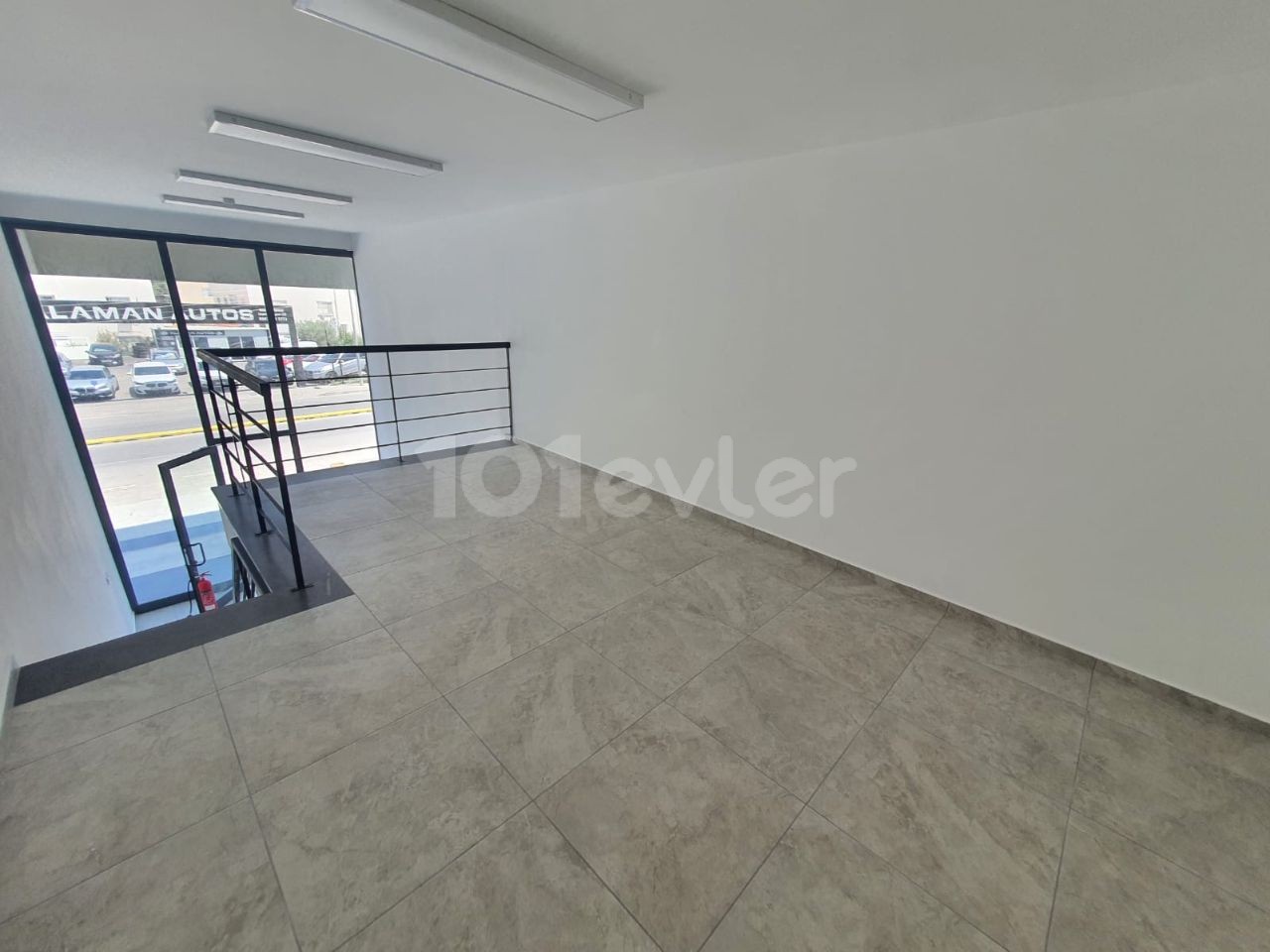 A 100 M2 LARGE SHOP FOR RENT ON A FAIRLY BUSY STREET OPPOSITE THE CENTRAL NICOSIA WITH A SMALL CREAM ** 