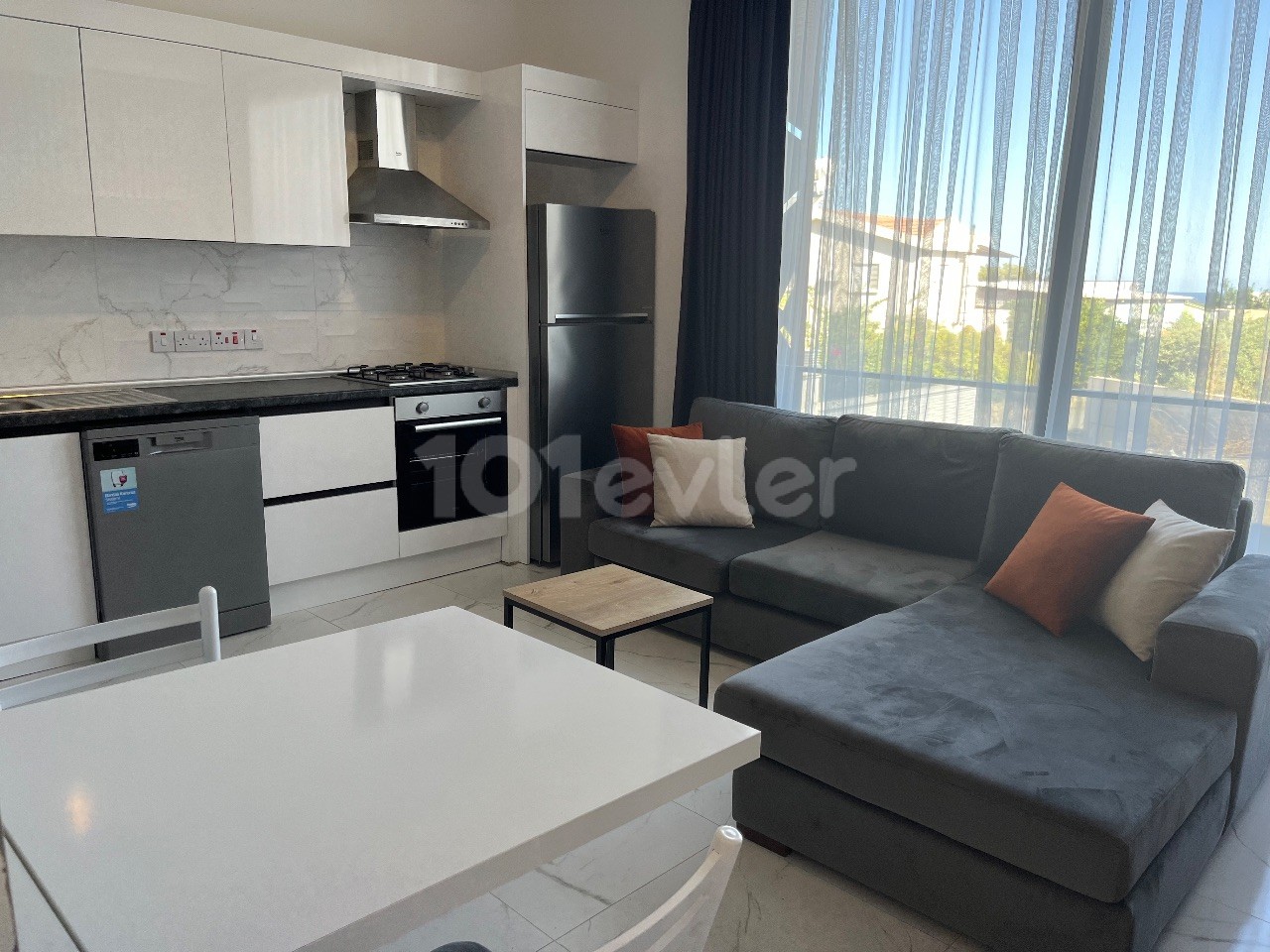 Luxury 2+1 Apartment on the Back Street of Şokmar Premium, Close to the Merit Hotels Area, 20 Meters from the Road and the Minibus Route, and with Camelot Beach Ahead.