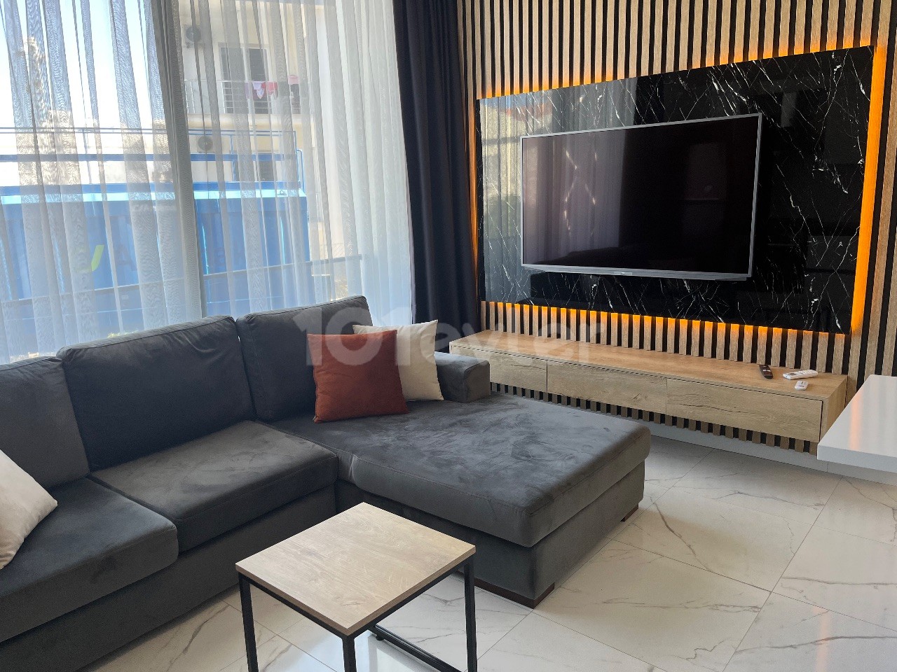 Luxury 2+1 Apartment on the Back Street of Şokmar Premium, Close to the Merit Hotels Area, 20 Meters from the Road and the Minibus Route, and with Camelot Beach Ahead.