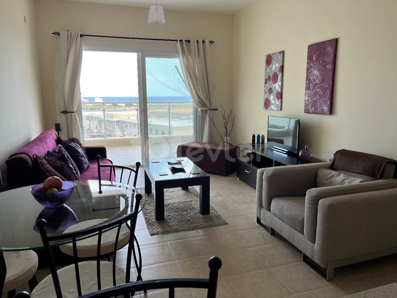 Fully Furnished 1+1 Flat for Sale in Iskele Cezar with Sea View