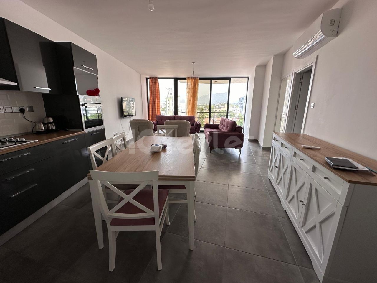 2+1 FULLY FURNISHED FLAT FOR RENT IN KYRENIA, WITH MOUNTAIN AND SEA VIEWS.
