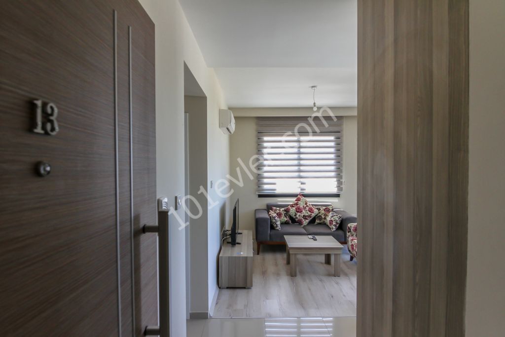 Girne merkezde 1+1 satılık deniz manzaralı daire