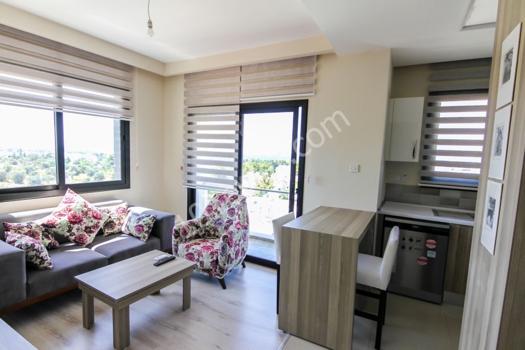 Girne merkezde 1+1 satılık deniz manzaralı daire