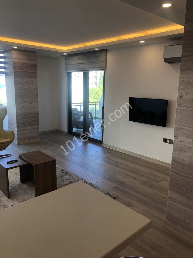 Feo Elegance'da ful eşyalı ortak havuzlu site içi güvenlikli 2+1 residence